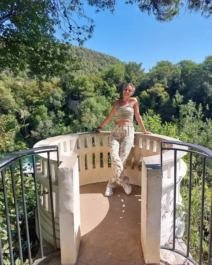 Ivana on a stone viewpoint terrace during a Krka National Park private walking tour