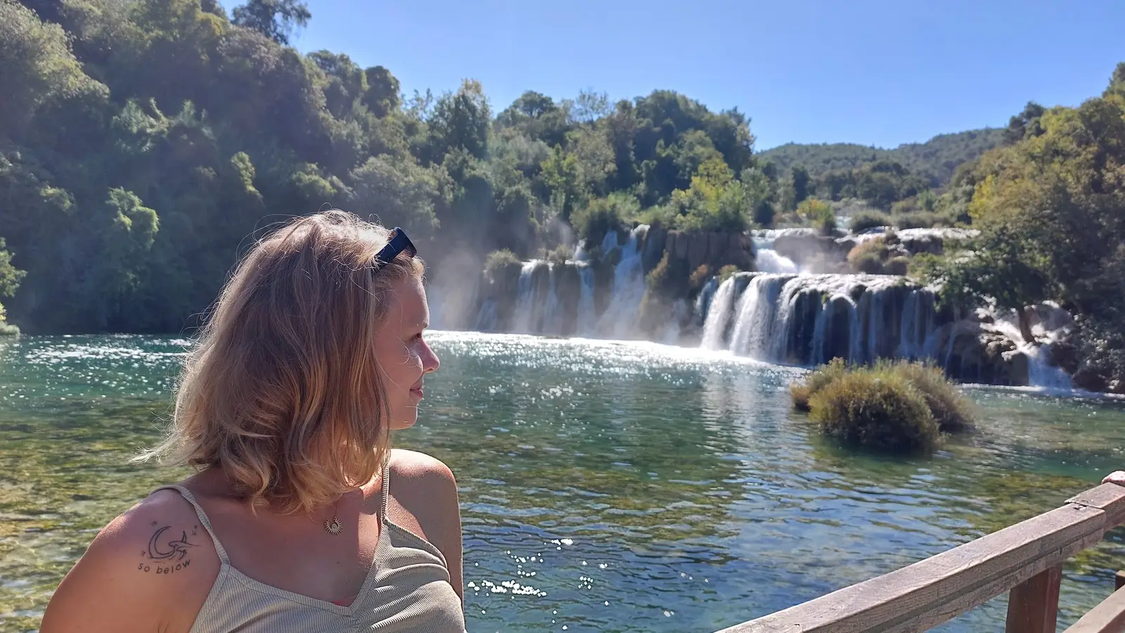 A visitor looking out over the Skradinski Buk waterfalls on the Krka National Park private walking tour