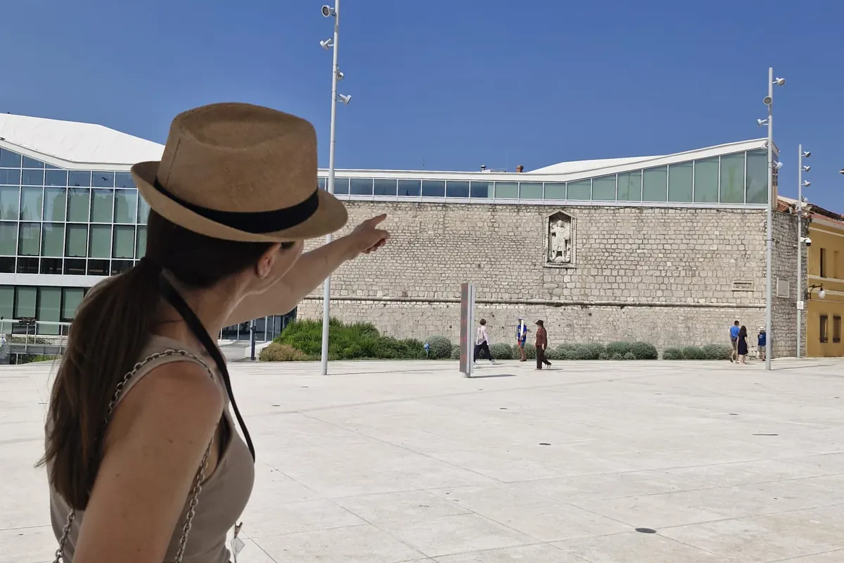 Ivana pointing out landmarks on the Šibenik Old Town private walking tour