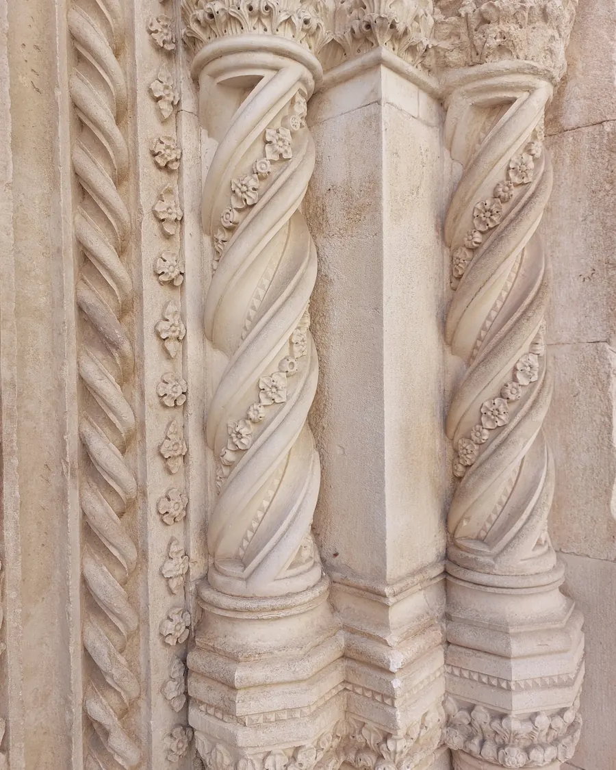 Twisted stone columns on the portal of the Cathedral of St. James in Šibenik