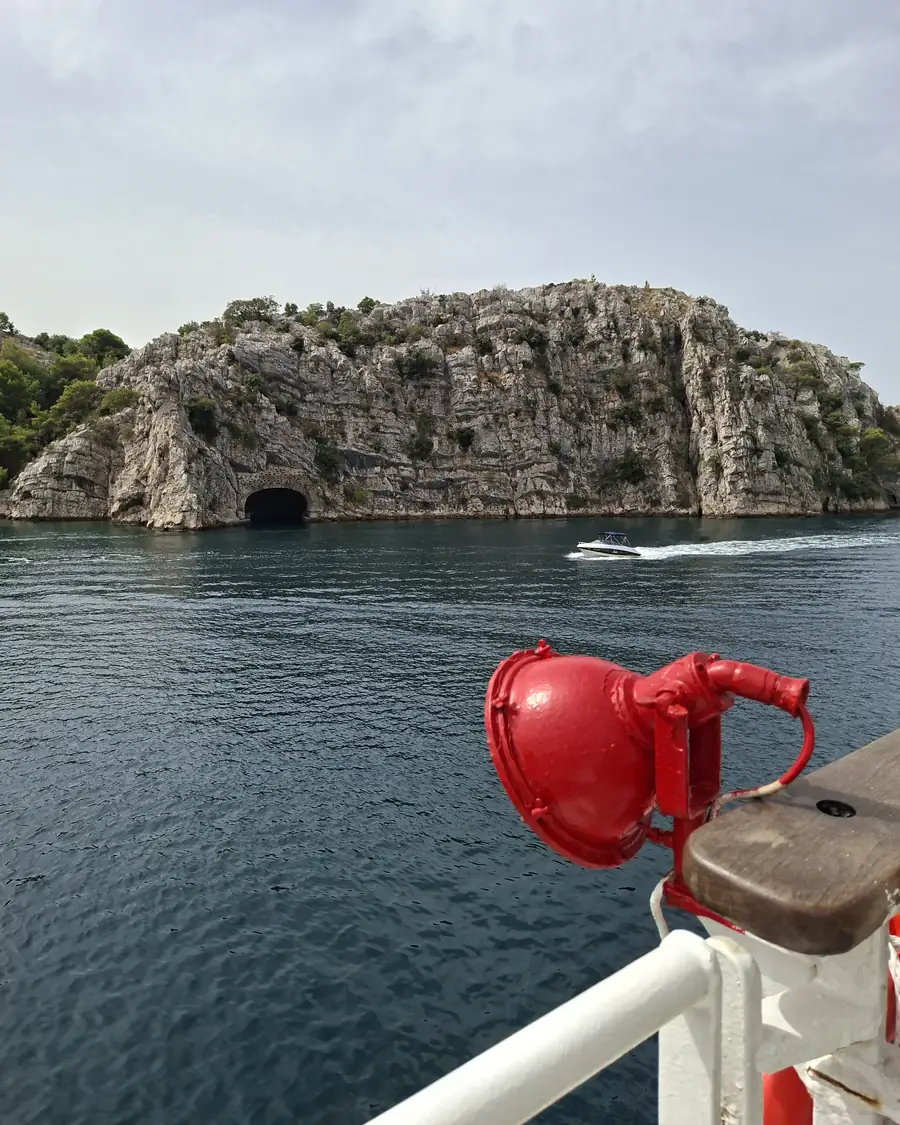 Limestone cliffs of the Šibenik channel seen from the boat on the way to Zlarin